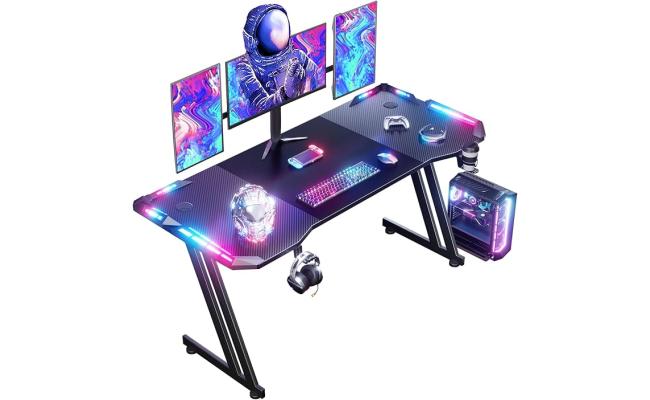 HLONONE 120 x 60 cm Gaming Table Gaming Desk with LED PC Table Gaming with Carbon Fiber Surface Stable Computer Table for Gaming with Headphone Hook and Cup Holder Black HLONONE 120 x 60 cm Gaming Table Gaming Desk with LED PC Table Gaming with Carbon Fiber Surface Stable Computer Table for Gaming with Headphone Hook and Cup Holder Black